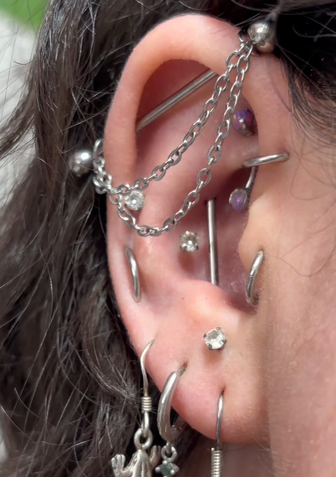 A curated ear styled in nickel free implant grade titanium