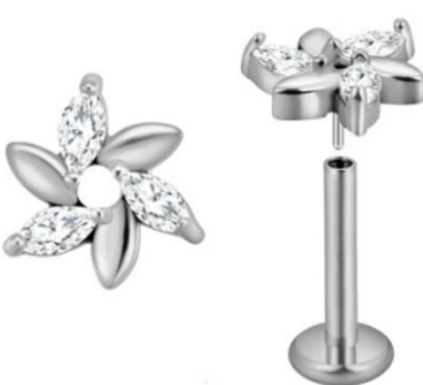 A silver zircon flat back labret stud in implant grade titanium by Willow and Thorn